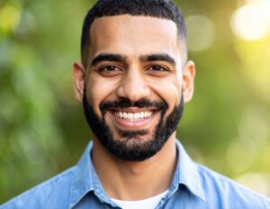 Firefly create a realistic looking image of a man portait shot 777922